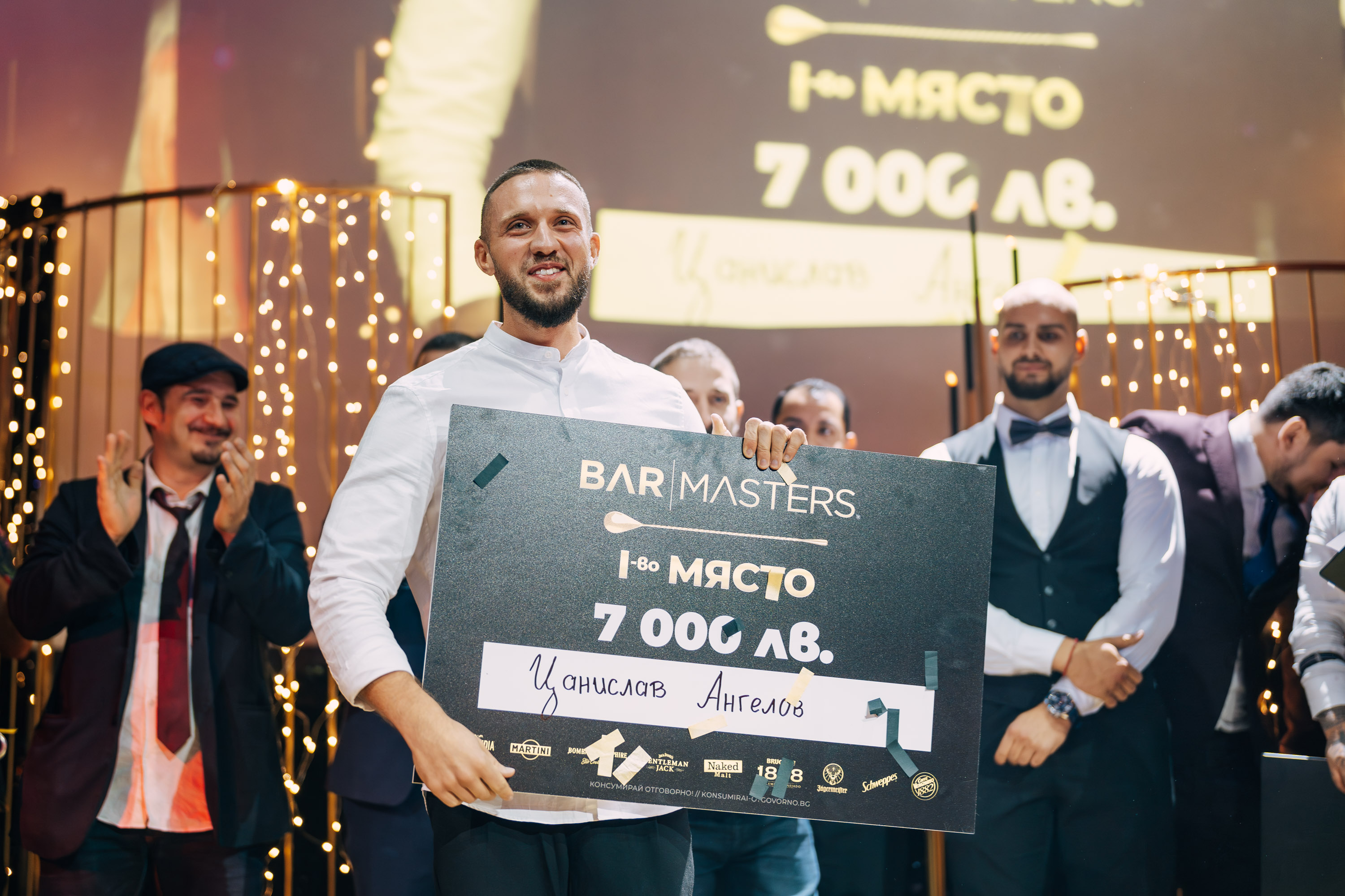 Tsanislav Angelov climbs the podium in the iconic Bar Masters program